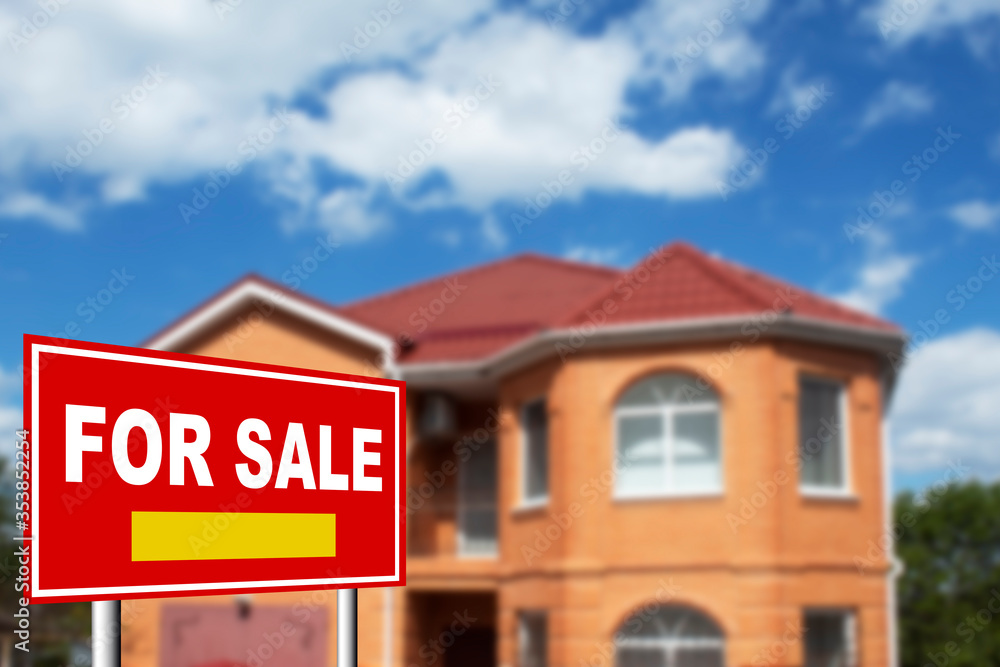 Home for sale. Sign in front of new home Home for sale. Sign in front of new home