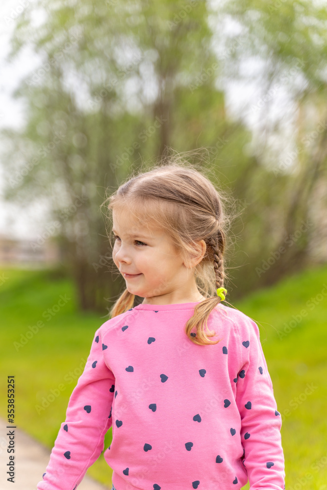 portrait of a 4 year old girl on an open air portrait of a 4 year old girl on an open air