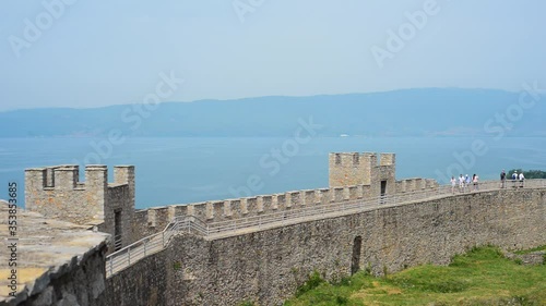 Ancient wall with towers of Samuels fort with lake horizon. photo