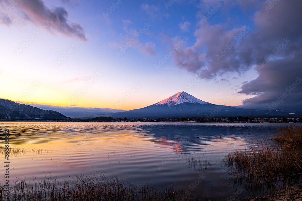 Red Mount Fuji with reflection on Lake Kawaguchiko during twilight