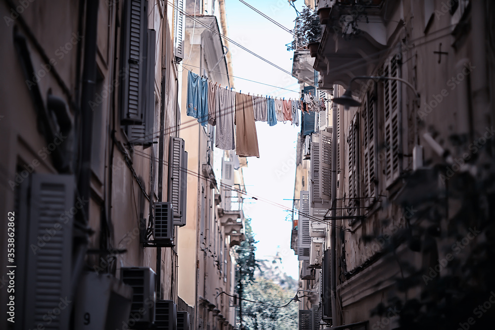 linen is dried in a narrow street of Italy, Italian lifestyle