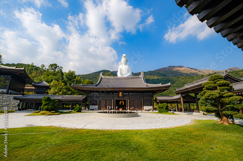 Photography Universal Gate Hall with its Chinese name above the entrance and buddhist teachi
