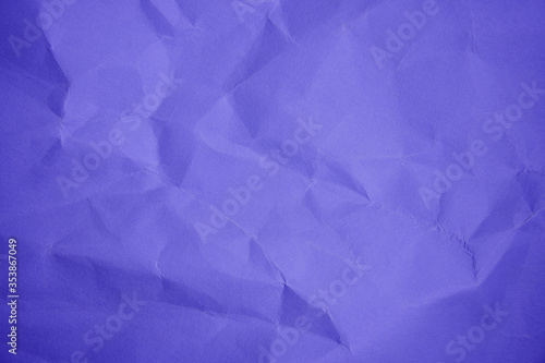 Violet Sheet crumpled paper color background Close up Copy space