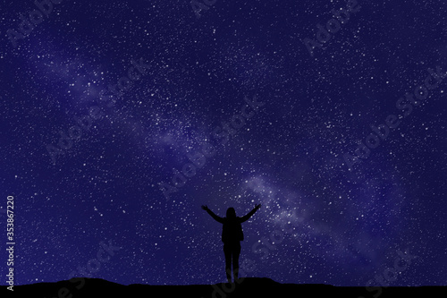 person silhouette over night sky background