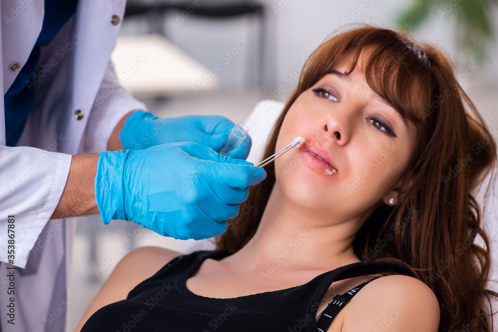Young woman visiting male doctor dermatologist Young woman visiting male doctor dermatologist