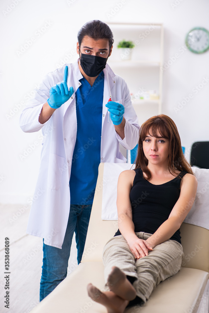 Obraz premium Young woman visiting male doctor dermatologist