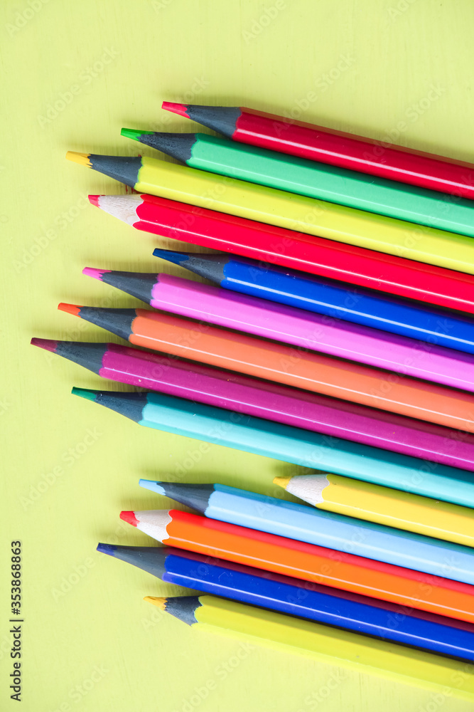 Colored pencils close-up on a white background. Back to school concept. Colored pencils close-up on a white background. Back to school concept.