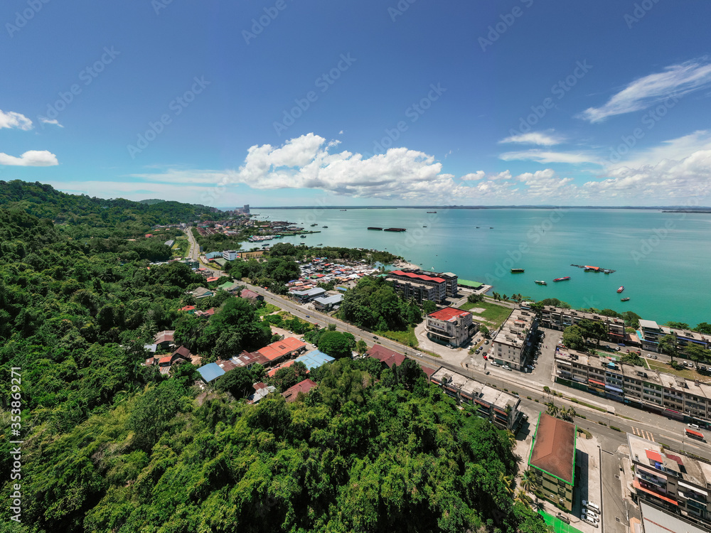 An aerial panorama view of Sandakan Town at Sabah. Sandakan is a city in the Malaysian state of Sabah, on the northeast coast of Borneo. 
