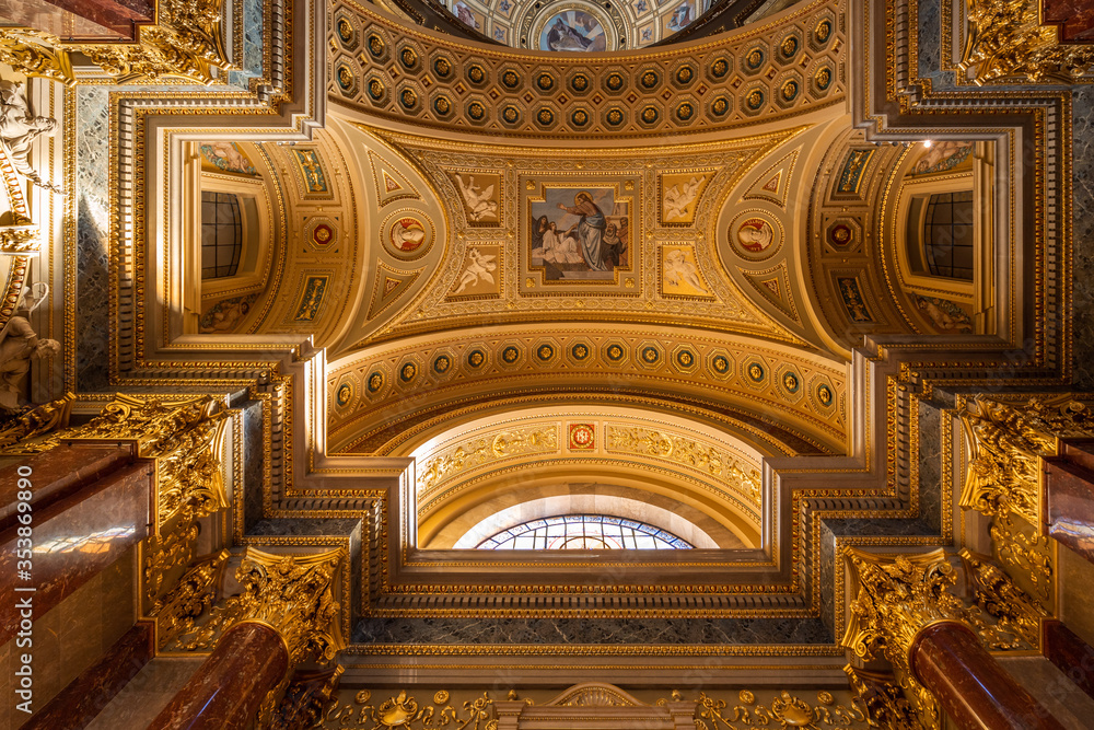 Budapest, Hungary - Feb 8, 2020: Luxarily decorated golden ceiling in St. Stephen Basilica