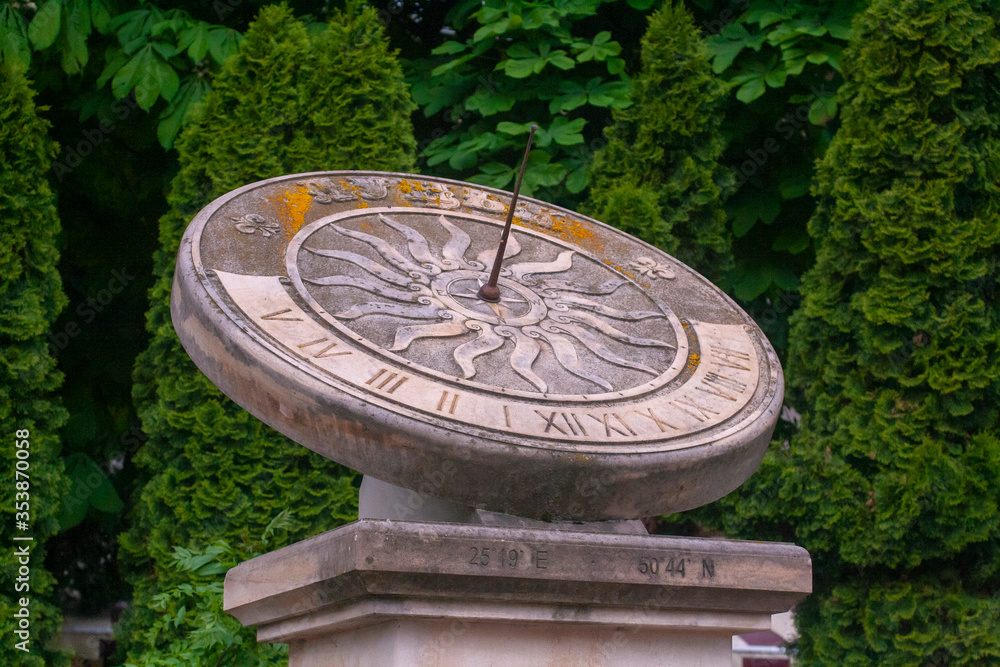 Sundial in the city. Architectural element.