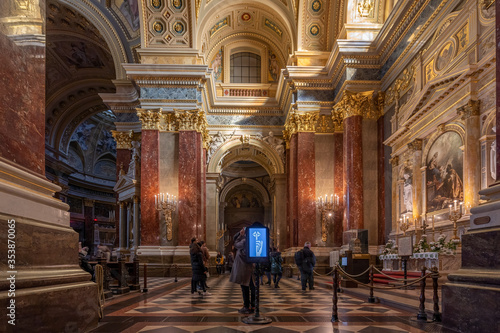 Budapest, Hungary - Feb 8, 2020: Tourist take photo inside St. Stephen Basilica nave