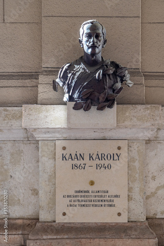 Budapest, Hungary - Feb 8, 2020:  Bronze bust of Karoly Kaan on linestone wall near Kossuth Square photo