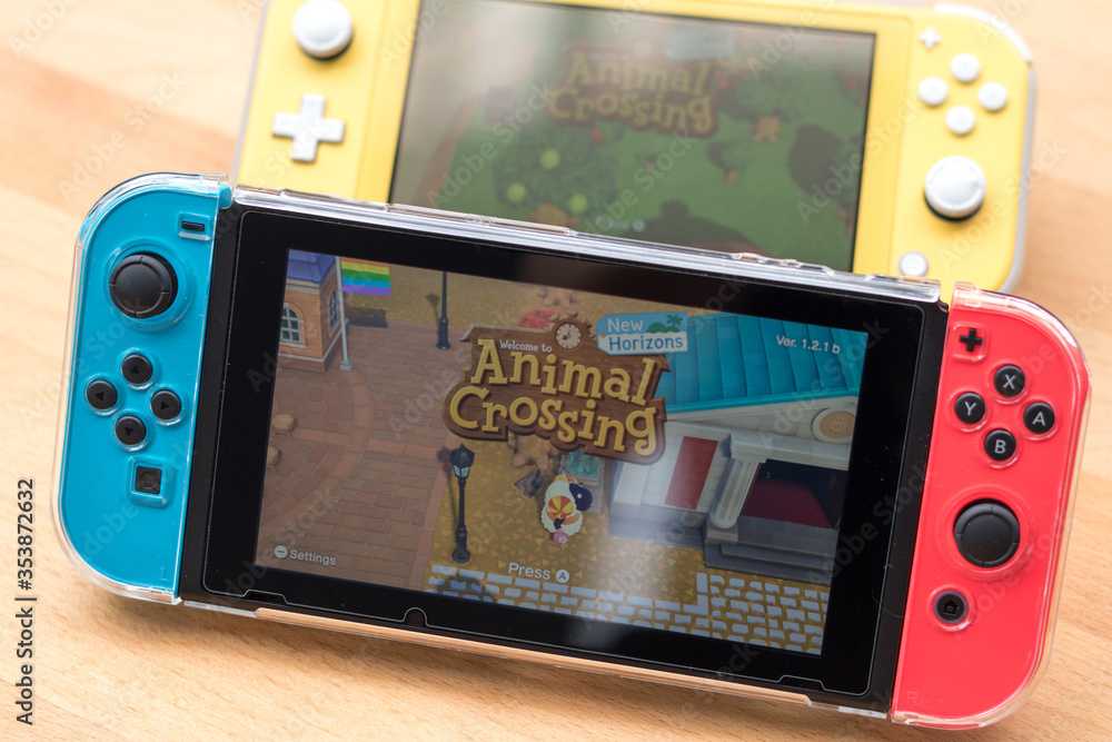 Bangkok,Thailand - May 30, 2020: Animal crossing game popular Nintendo  switch with joy controllers family friend activity playing together. Photos  | Adobe Stock