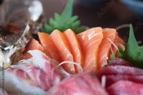 Sashimi mix consists of salmon and etc. in a restaurant.