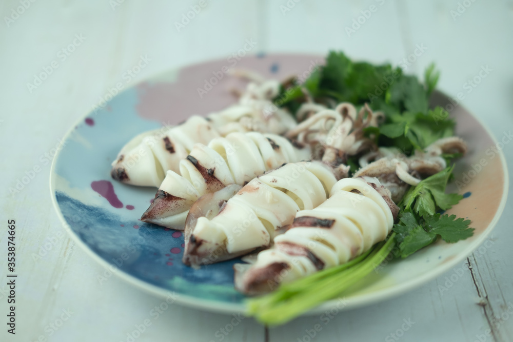 Steamed squids or Octopus on dish.