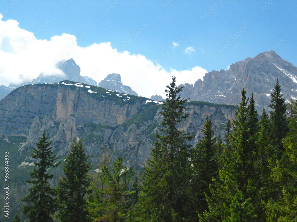 A snowy mountain near Lake Misurina in Northern Italy with foreground trees 

