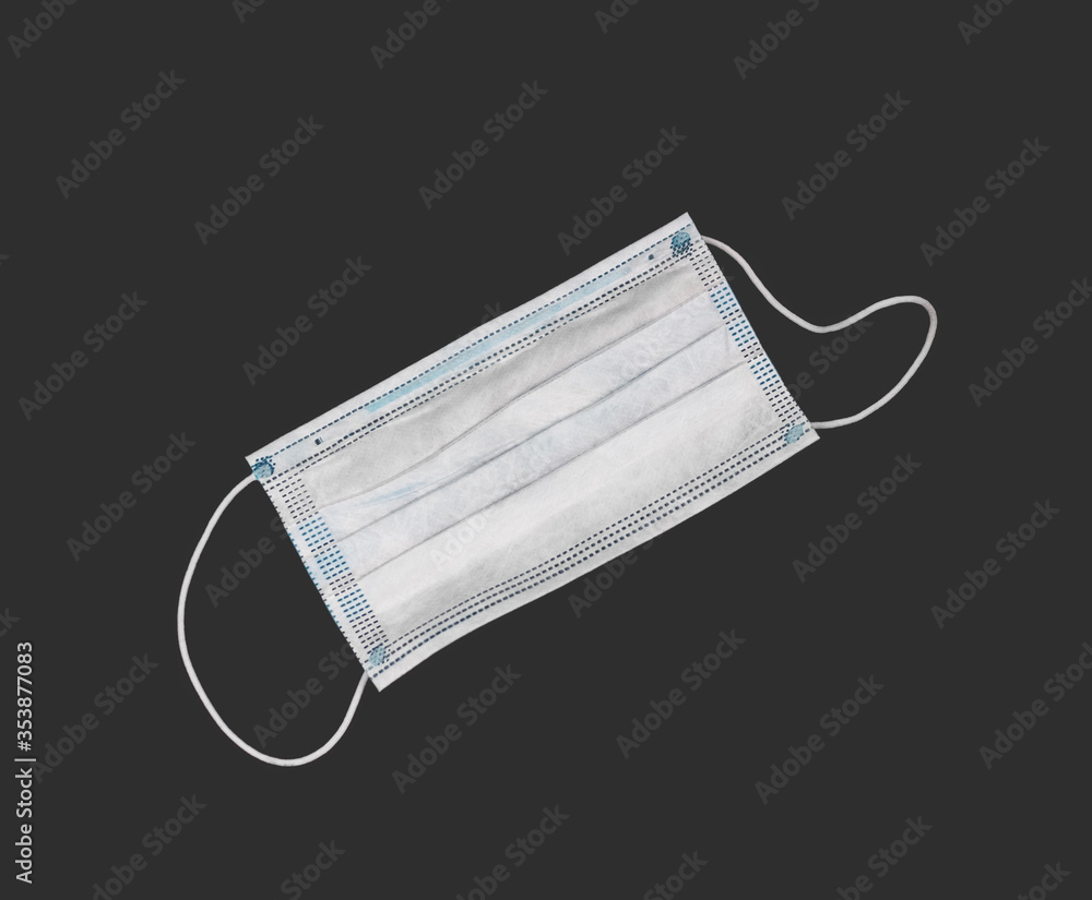 Medical mask. The view from the top. Isolated on a grey background Medical mask. The view from the top. Isolated on a grey background