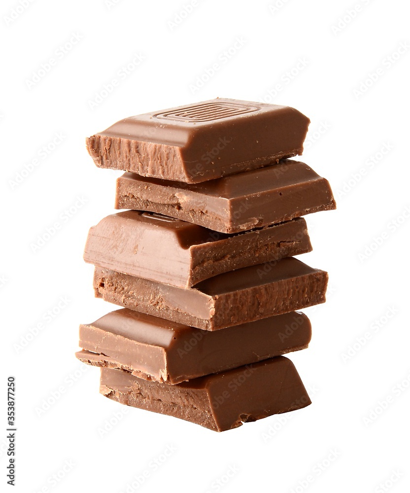 Stack of chocolate pieces isolated over white.