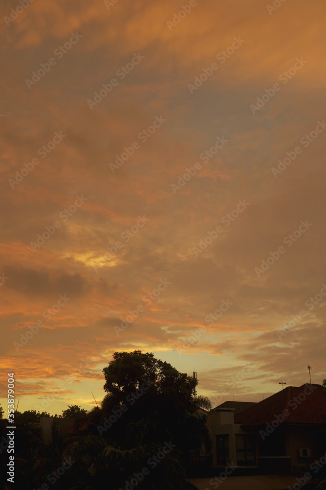 Fototapeta premium Orange clouds and sky during sunset
