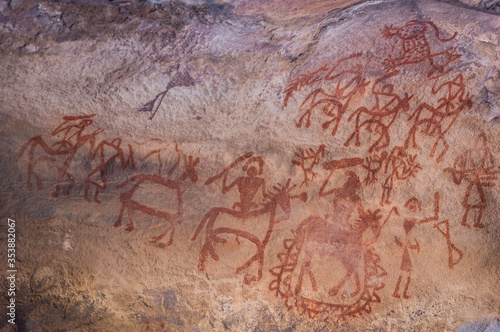 Bhimbetka Rock Shelters, Madhya Pradesh, India. Declared a UNESCO World Heritage site in 2003, the shelters contain ancient rock art from the Upper Paleolithic to Medieval times photo