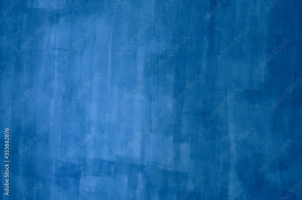 Blue background painted by brush on the white wall, blurred. Blue background painted by brush on the white wall, blurred.