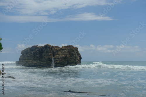 Fissures in a large rock off the coast of El Penon near Playa Cocal on the Pacific Coast of Costa Rica