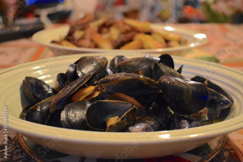 French style cooked wedge shaped mussels Shells are much longer than wide come in two halves that close and inside contain the meat. Shellfish is loaded with protein healthy fats that aid weight loss