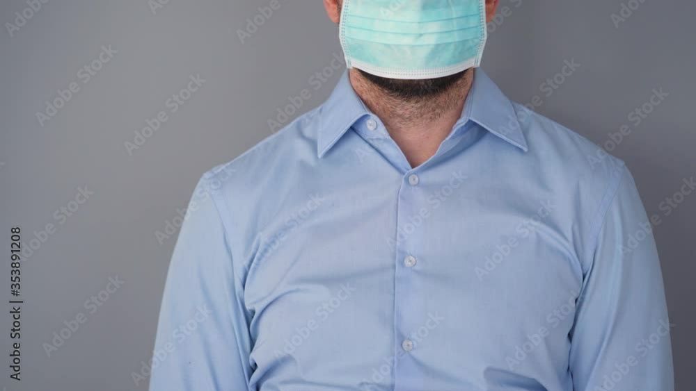 Pandemic protection of the Covid-19 coronavirus. Portrait of a bearded caucasian man in a medical face mask. Virus protection. Pandemic protection of the Covid-19 coronavirus. Portrait of a bearded caucasian man in a medical face mask. Virus protection.