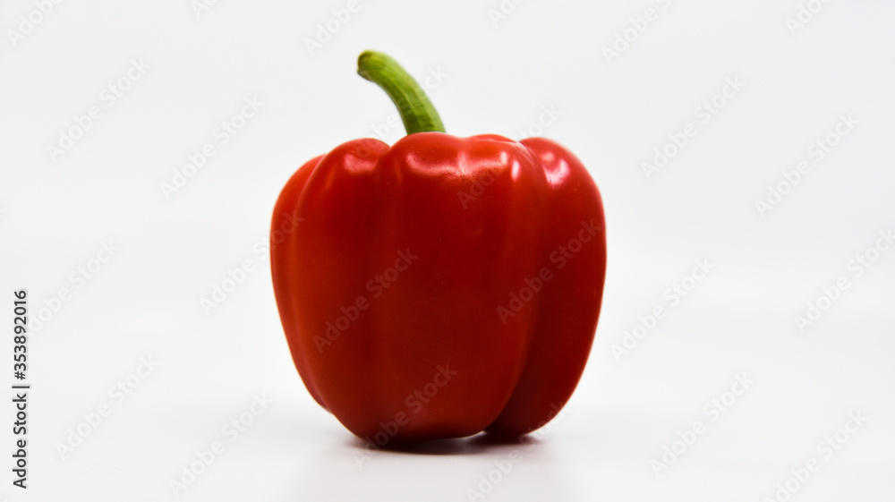 Red pepper with a white background Red pepper with a white background