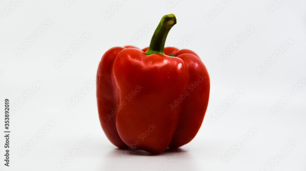 Red pepper with a white background Red pepper with a white background
