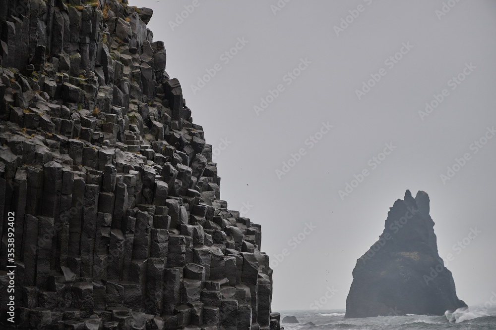 Naklejka premium basalt cliffs on the Iceland coast near Vik