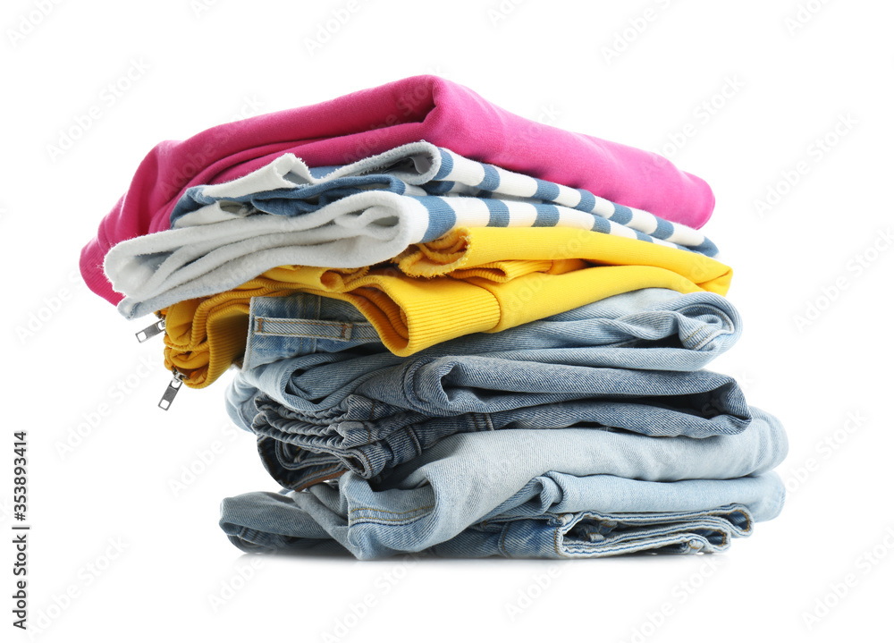 Stack of folded clothes isolated on white Stack of folded clothes isolated on white