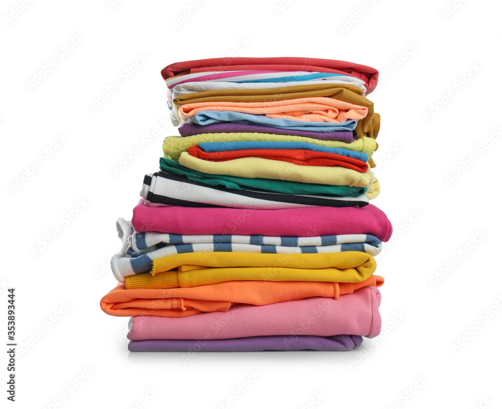 Stack of folded clothes isolated on white Stack of folded clothes isolated on white