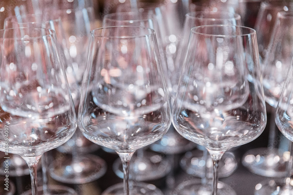 Plenty of empty clean wine glasses on the table during a banquet Plenty of empty clean wine glasses on the table during a banquet