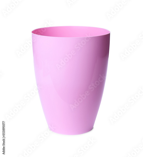 Pink plastic flower pot isolated on white