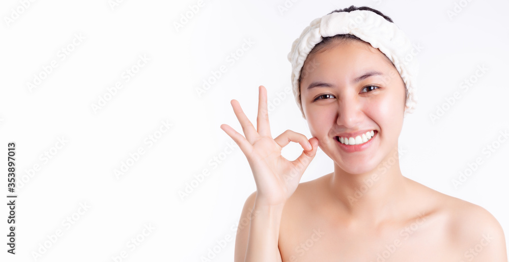 Beauty girl has clear face, nice collagen facial skin. Asian young woman get satisfied product of spa, cosmetology, cosmetic by guarantee and giving ok with smiley face. Young lady has healthy skin Beauty girl has clear face, nice collagen facial skin. Asian young woman get satisfied product of spa, cosmetology, cosmetic by guarantee and giving ok with smiley face. Young lady has healthy skin