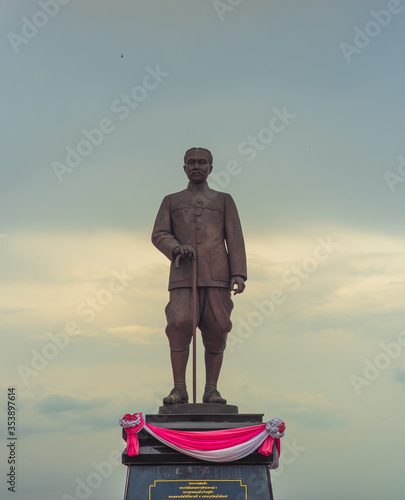 Phatthalung, THAILAND - July 8, 2019: King statue in the beautiful sky at Lampam beach photo