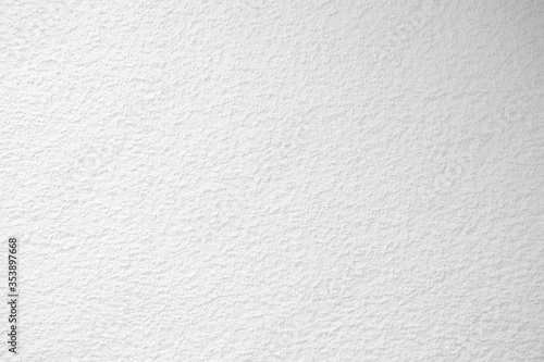 White Stucco Wall Texture Background with Light Beam on the Surface.