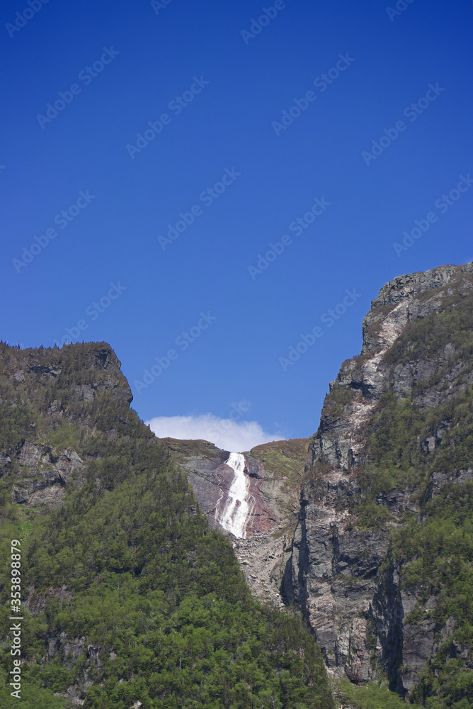 Obraz premium Waterfalls from the cloud at West Brook pond, Gros Morne National Park, Newfoundland, Canada