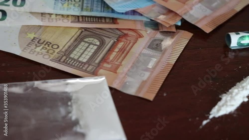 Money and drugs on the table, ready for consumption