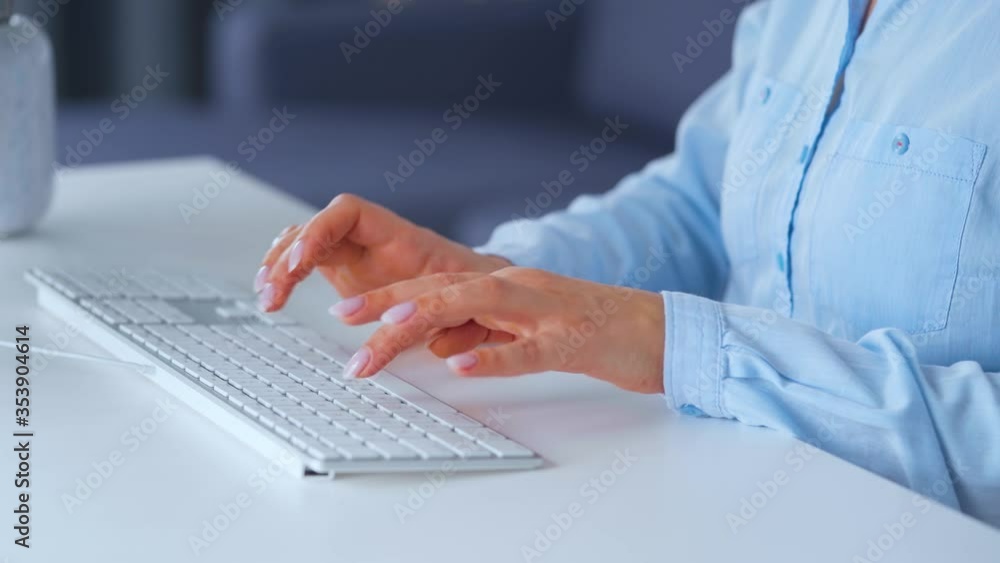 Woman typing on a computer keyboard. Concept of remote work. Woman typing on a computer keyboard. Concept of remote work.