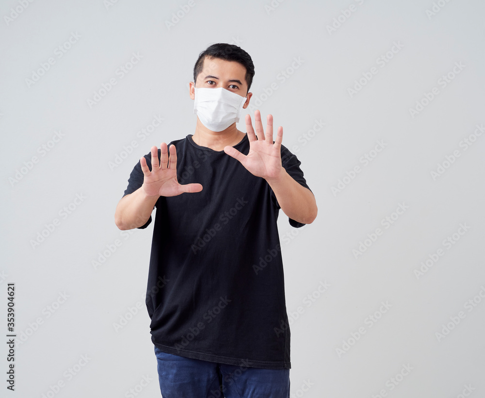 Young man shows a hand stop sign. Young man shows a hand stop sign.