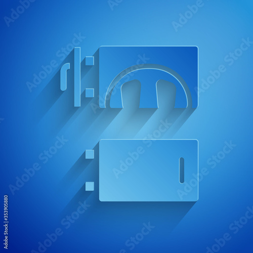 Paper cut Crematorium icon isolated on blue background. Paper art style. Vector.