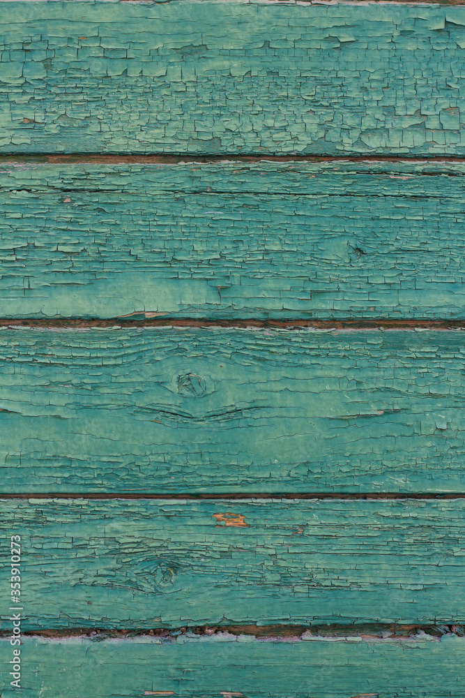 Aged green painted wood wall