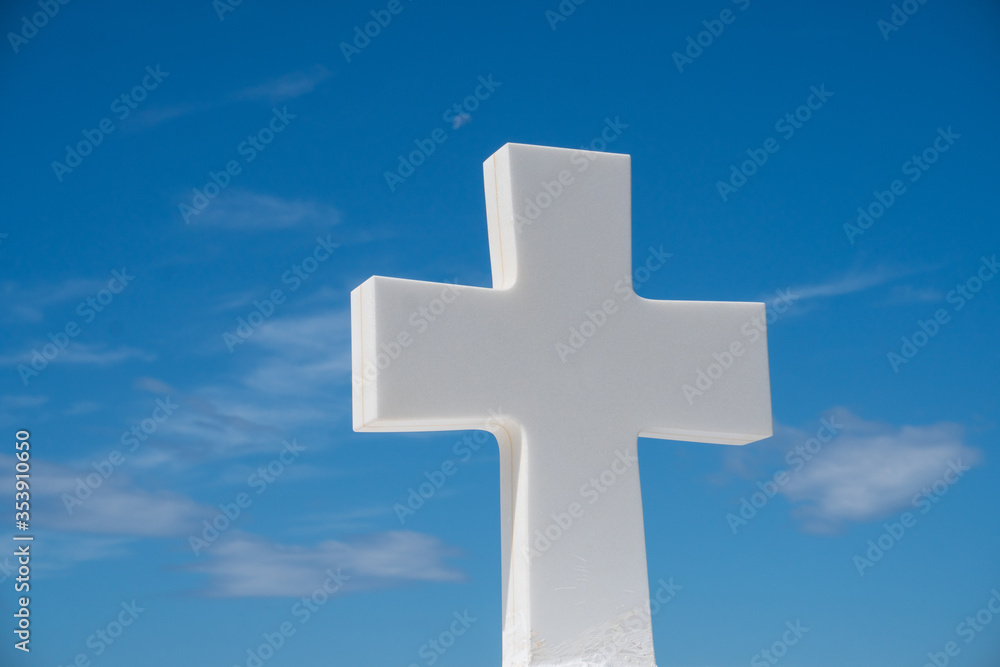 white cross on blue sky