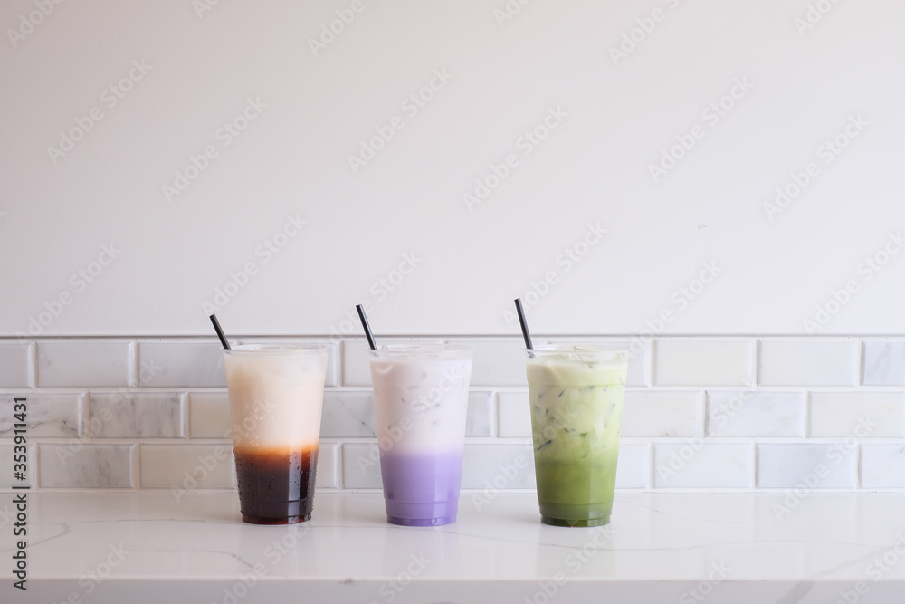 thai ice tea with taro milk tea and matcha green tea. thai ice tea with taro milk tea and matcha green tea.