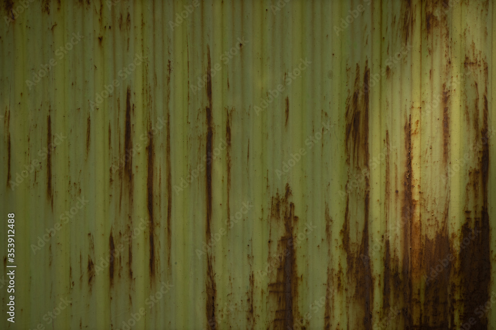 Obraz premium Texture of an rusty metal, painted in green color