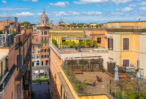 Panorama from Trinità dei Monti with the dome of the Basilica of Ambrogio e Carlo al Corso, in Rome, Italy. photo