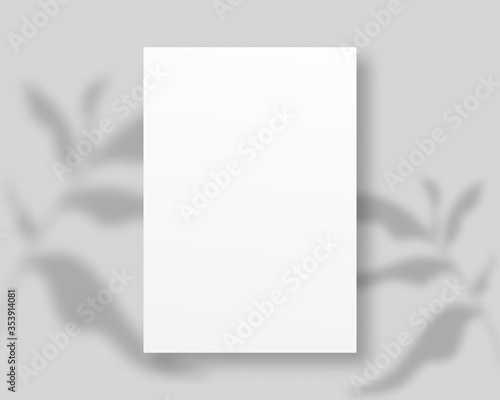 Empty white paper with shadow overlay. A4 paper isolated on grey background. 