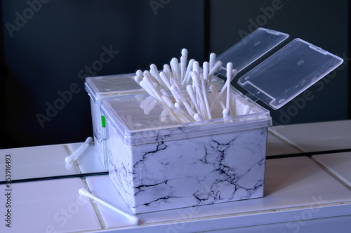 cotton cosmetic sticks
 woman mirror